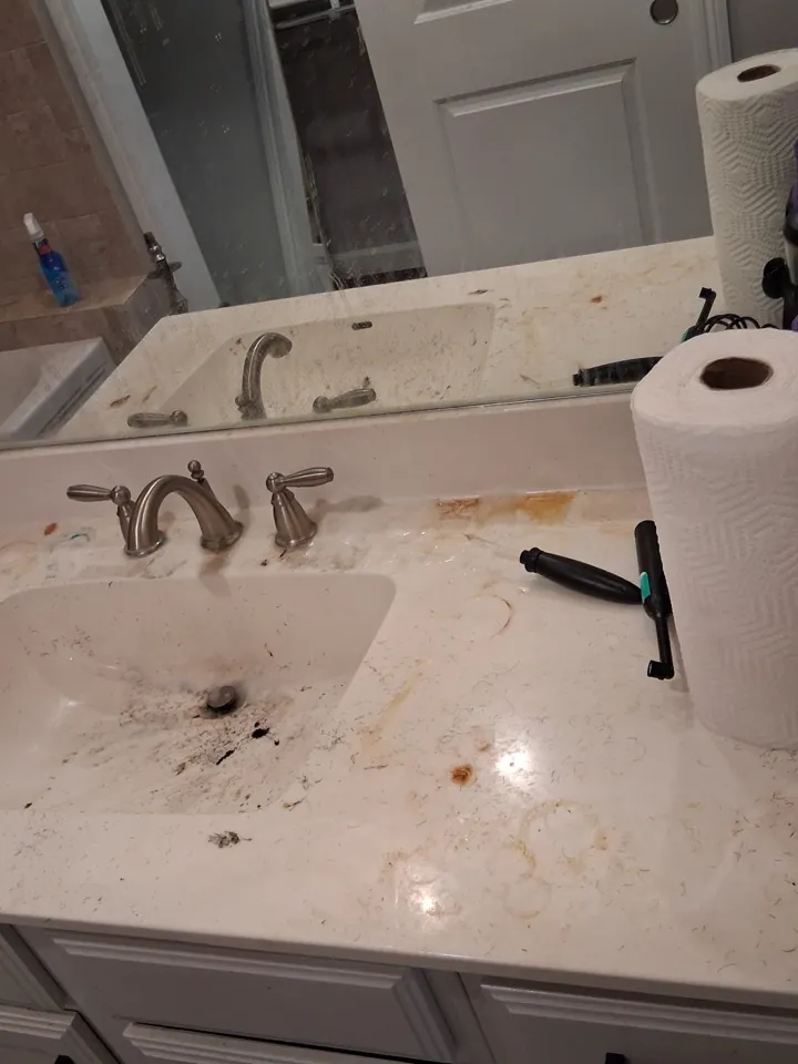 Bathroom vanity before a Swept Up deep clean