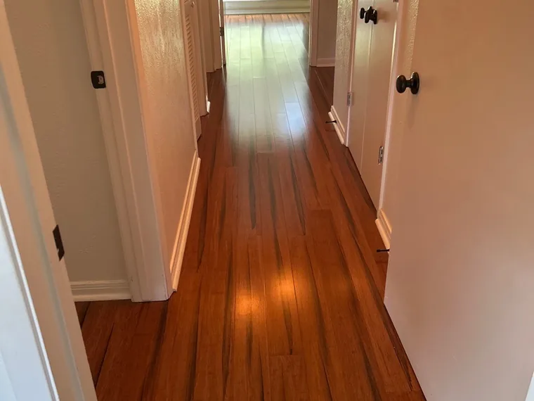 Hallway wood floors after a final clean