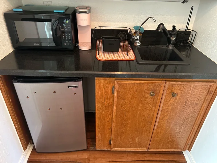Office break room kitchenette cleaned